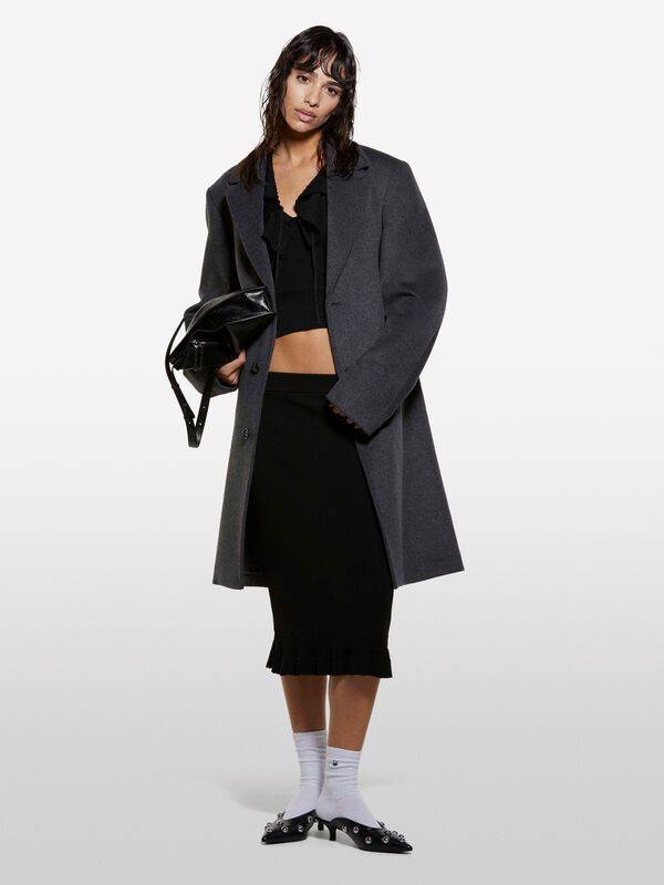 Schwarzes Stricktop mit Rüschen - top für damen | Sisley