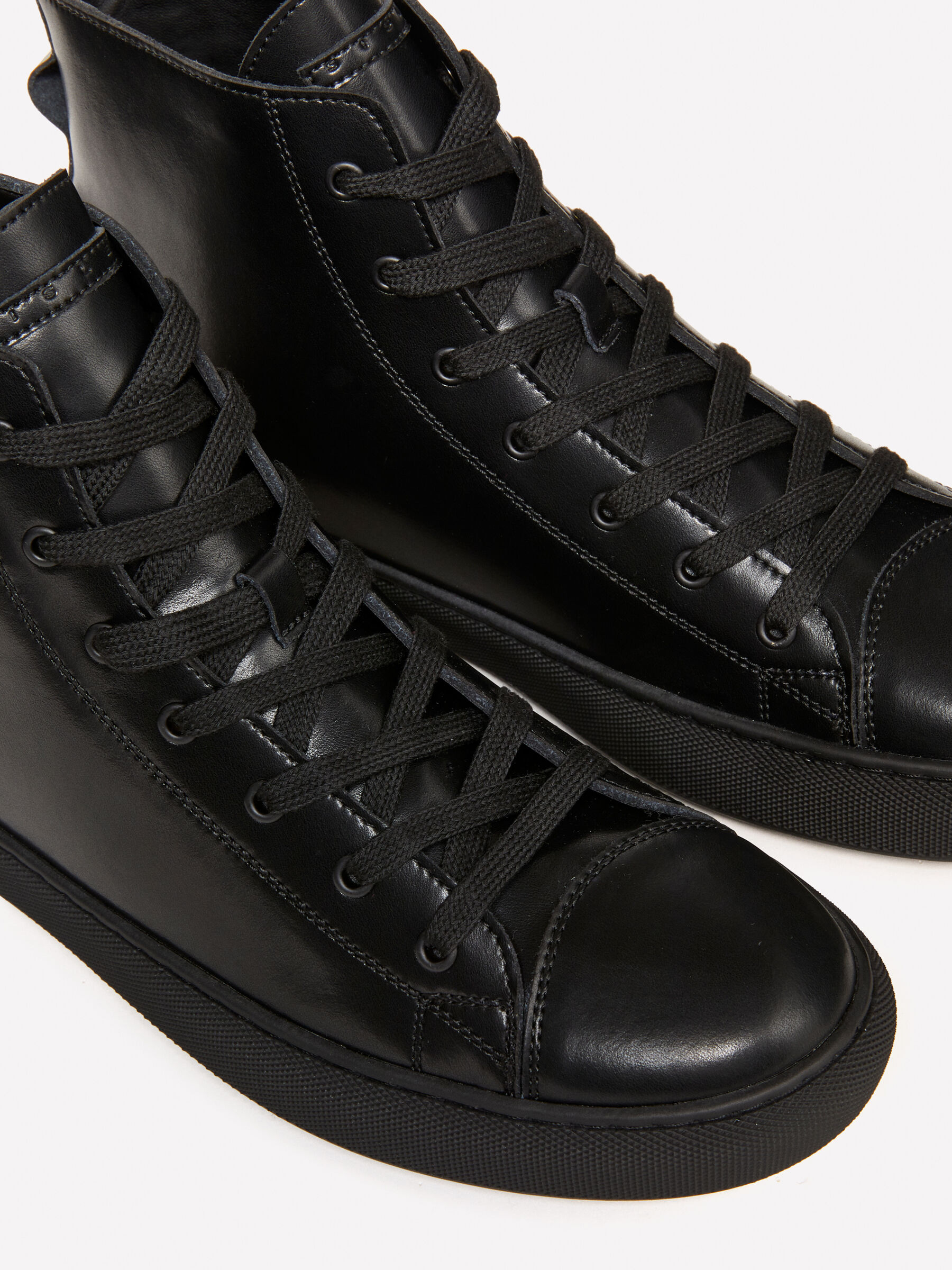 Superga nere alte pelle top