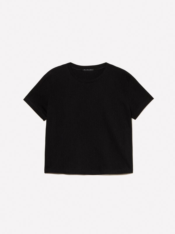 Schwarzes T-Shirt mit kastiger Passform Schwarzes T-Shirt mit kastiger Passform - kurzärmeliges t-shirt für damen | Sisley